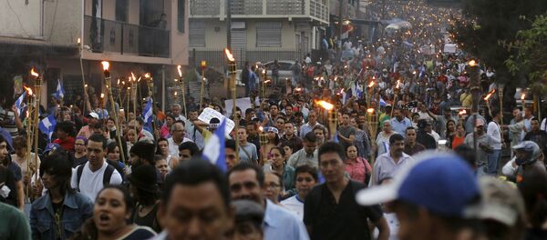 Marcha de las antorchas en Tegucigalpa - Sputnik Mundo