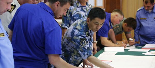 Maniobras ruso-chinas Cooperación Naval 2015 Maniobras ruso-chinas Cooperación Naval 2015 - Sputnik Mundo