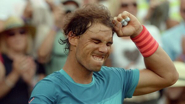 El español Rafael Nadal celebra luego de vencer al francés, Gael Monfils, en la semifinal del torneo de Stuttgart, Alemania, el sábado 13 de junio de 2015 - Sputnik Mundo