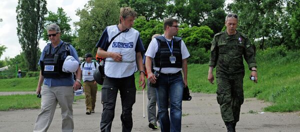 Observadores de la OSCE en Donetsk (Archivo) - Sputnik Mundo