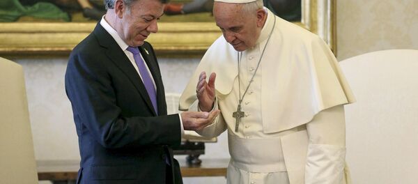Juan Manuel Santos, presidente de Colombia y Papa Francisco - Sputnik Mundo