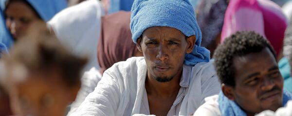 Migrantes en Italia - Sputnik Mundo