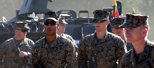 U.S. soldiers attend an opening ceremony of military exercise 'Saber Strike 2015', at the Gaiziunu Training Range in Pabrade some 60km.(38 miles) north of the capital Vilnius, Lithuania, Monday, June 8, 2015. - Sputnik Mundo
