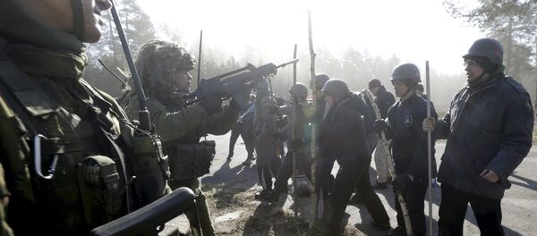 The Lithuanian Army's rapid reaction force unit carries an anti-riot drill in Rukla, Lithuania, in this March 19, 2015 file picture. - Sputnik Mundo