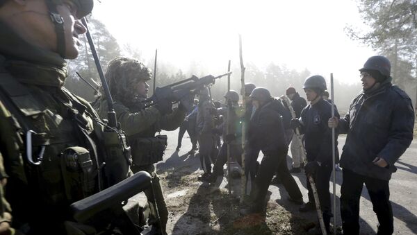 The Lithuanian Army's rapid reaction force unit carries an anti-riot drill in Rukla, Lithuania, in this March 19, 2015 file picture. - Sputnik Mundo