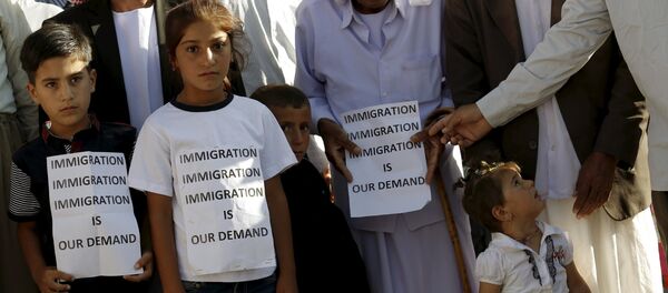 Gente en el campo de refugiados sirios e iraquíes en Midyat, Turquía, el 20 de junio, 2015 - Sputnik Mundo