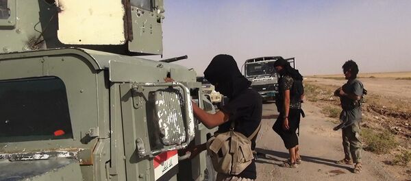 Militantes del Estado Islámico - Sputnik Mundo