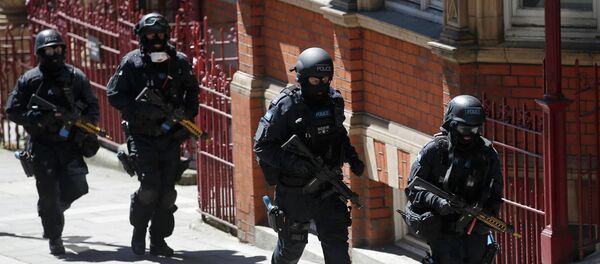 Зolicías británicos Зolicías británicos - Sputnik Mundo