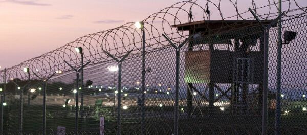 Guard tower at dawn at Camp Delta the military prison at Naval Base Guantanamo Bay Cuba - Sputnik Mundo
