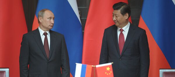 Presidente de Rusia Vladímir Putin y Presidente de China Xi Jinping  (Archivo) - Sputnik Mundo