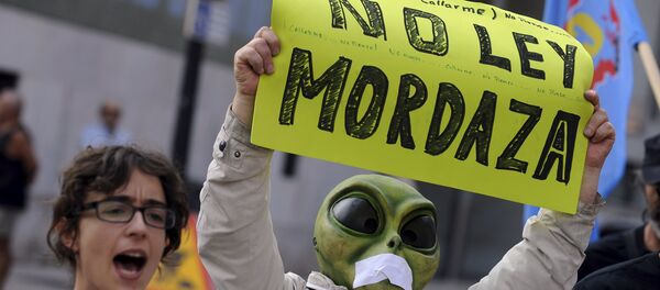 Protesta contra la ley mordaza en Gijón, España, el 30 de junio, 2015 - Sputnik Mundo