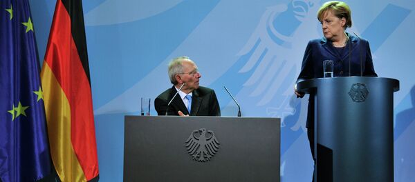 Ministro de Finanzas de Alemania, Wolfgang Schauble y canciller de Alemania Angela Merkel - Sputnik Mundo