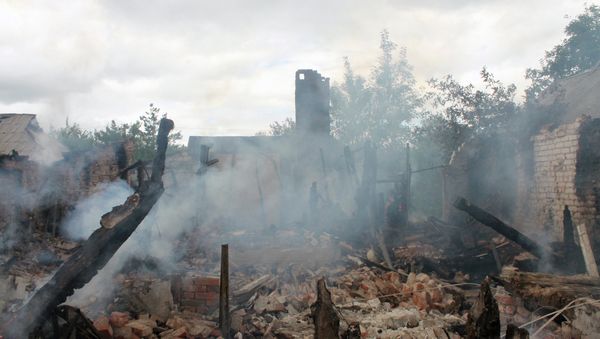 Ruinas en Donbás Ruinas en Donbás - Sputnik Mundo