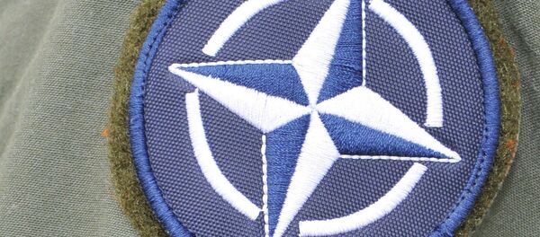 Logo de la OTAN - Sputnik Mundo