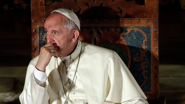 Pope Francis listens to a speech during his visit to the San Francisco Church in Quito, Ecuador, Tuesday, July 7, 2015. - Sputnik Mundo