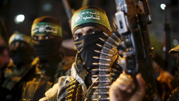 Palestinians Hamas militants march during an anti-Israel rally in Gaza City July 8, 2015. - Sputnik Mundo