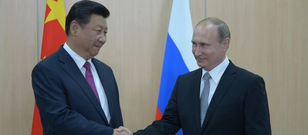 Xi Jinping, presidente de China, y Vladímir Putin, presidente de Rusia - Sputnik Mundo