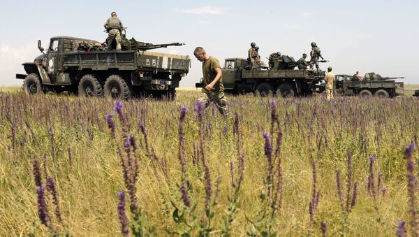 Anti-aircraft gunners of Ukrainian forces take part in exercises not far from southeastern city of Mariupol, Donetsk region on July 7, 2015. - Sputnik Mundo