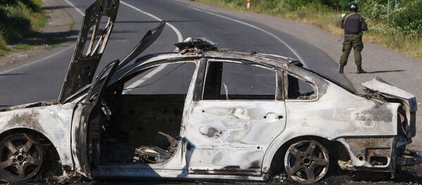 Un militar del Ministerio del Interior tras un tiroteo en Mukachevo - Sputnik Mundo