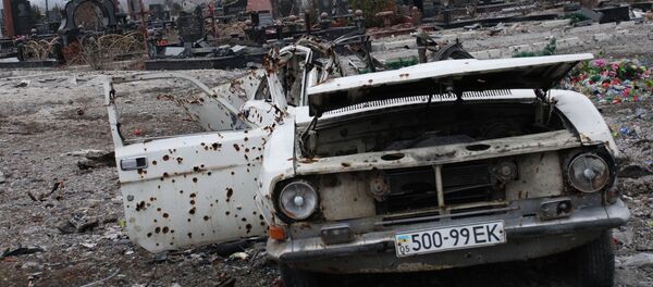 Consecuencias del bombardeo en Donetsk Consecuencias del bombardeo en Donetsk - Sputnik Mundo