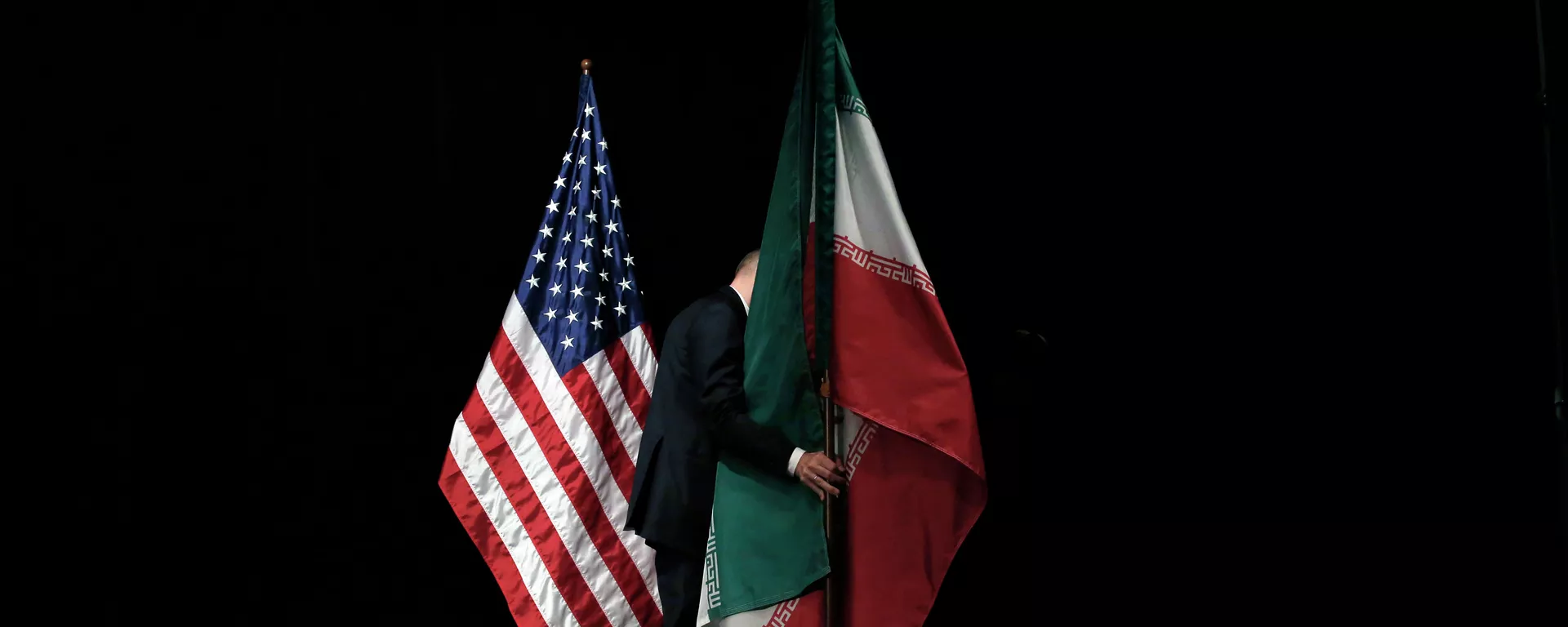 Banderas de EEUU e Irán Banderas de EEUU e Irán - Sputnik Mundo, 1920, 18.02.2021