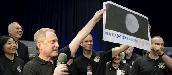 NASA celebra el acercamiento de la sonda New Horizons a Plutón, el 14 de julio, 2015 - Sputnik Mundo