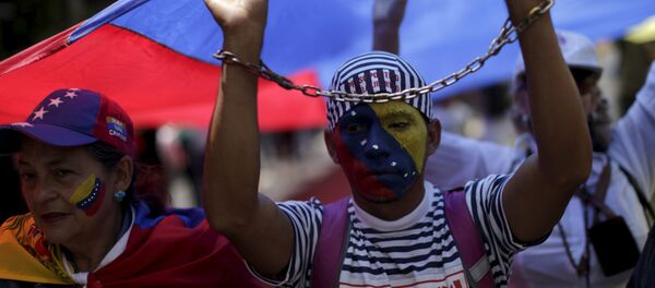 Manifestación en apoyo de la oposición venezolana en Caracas, el 20 de julio, 2015 - Sputnik Mundo