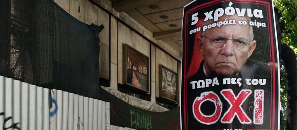 Póster con la imágen de Wolfgang Schäuble en Atenas - Sputnik Mundo