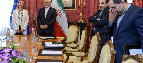 Alta representante de la UE para Asuntos Exteriores, Federica Mogherini, y ministro de Asuntos Exteriores de Irán, Mohammad Javad Zarif - Sputnik Mundo