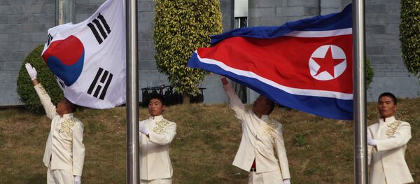 Banderas de Corea del Sur y Corea del Norte - Sputnik Mundo