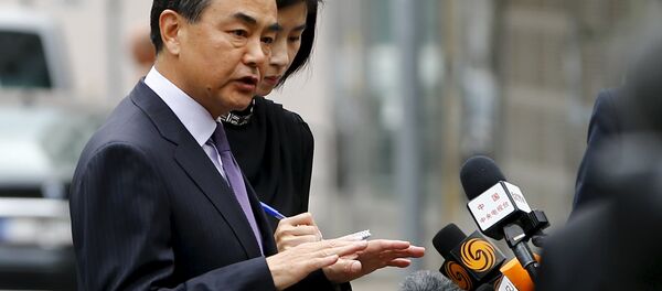 El ministro de Exteriores chino, Wang Yi - Sputnik Mundo