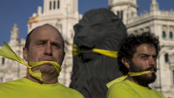 Protesta contra la Ley Mordaza en Madrid, el 30 de julio, 2015 - Sputnik Mundo