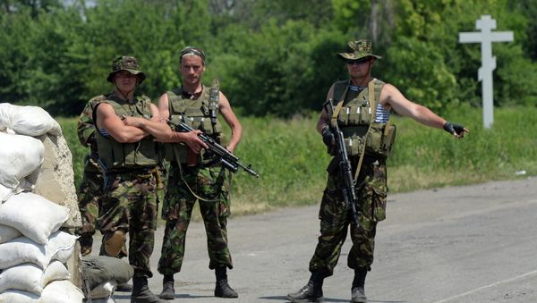 Militares de las Fuerzas Armadas de Ucrania en el puesto de control en la región de Donetsk (archivo) Militares de las Fuerzas Armadas de Ucrania en el puesto de control en la región de Donetsk (archivo) - Sputnik Mundo