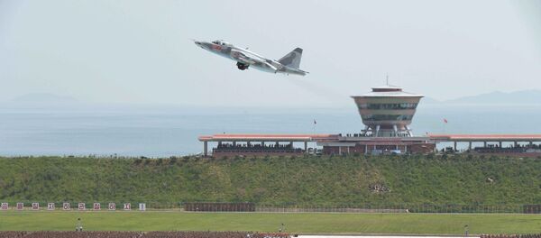 Un avión despega en el aeropuerto de Kalma, Corea del Norte Un avión despega en el aeropuerto de Kalma, Corea del Norte - Sputnik Mundo