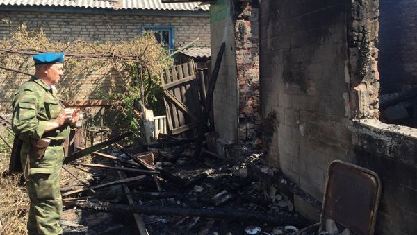Consecuencias del bombardeo en Górlovka, región de Donbás Consecuencias del bombardeo en Górlovka, región de Donbás - Sputnik Mundo