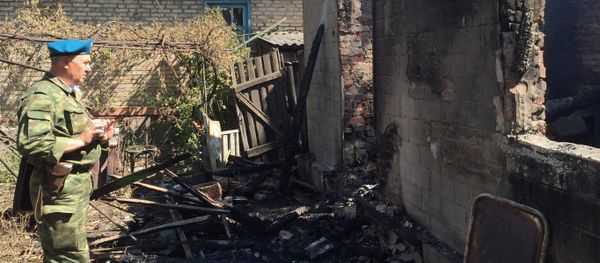 Consecuencias del bombardeo en Górlovka, región de Donbás - Sputnik Mundo