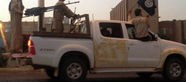 Militantes del grupo Estado Islámico (archivo) - Sputnik Mundo