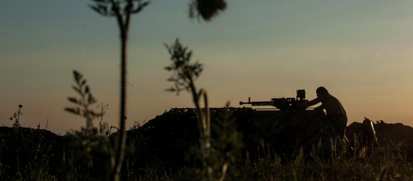 La línea de frente en el pueblo de Krymske, al este de Ucrania - Sputnik Mundo