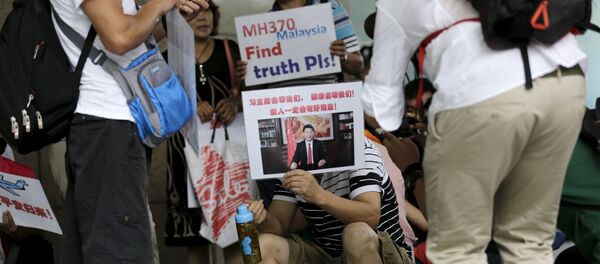 Familiares de los pasajeros del vuelo MH370 - Sputnik Mundo