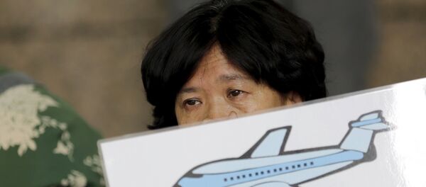 Familiares de los pasajeros del vuelo MH370 - Sputnik Mundo