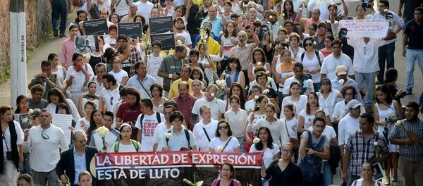 Journalists, activists and civil society members march to demand for justice for the five people killed in the country's capital, including a photojournalist, in Xalapa, Mexico - Sputnik Mundo