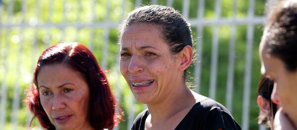 Mujer de una de las víctimas del ataque en São Paulo - Sputnik Mundo