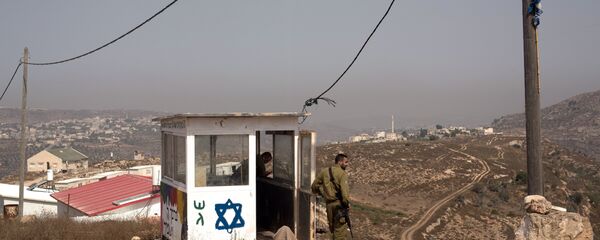 Unos soldados israelíes en Cisjordania - Sputnik Mundo