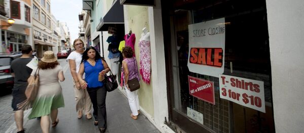 Una tienda cerrada en San Juan, Puerto Rico Una tienda cerrada en San Juan, Puerto Rico - Sputnik Mundo