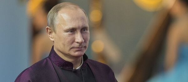 Vladímir Putin durante su visita a China en 2014 - Sputnik Mundo