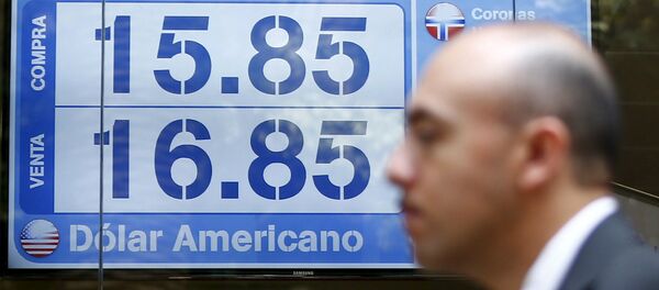 El peso cae a un nuevo mínimo histórico en México y espera la locura - Sputnik Mundo