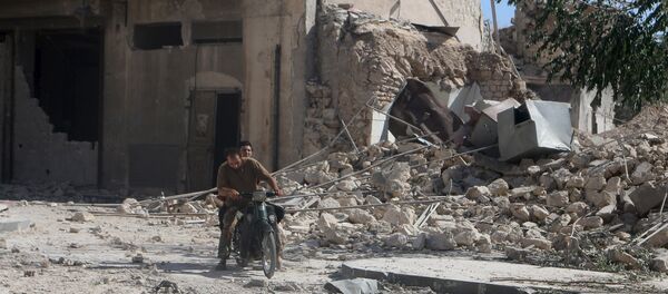 Una zona destruida en la ciudad de Alepo (noroeste de Siria) Una zona destruida en la ciudad de Alepo (noroeste de Siria) - Sputnik Mundo