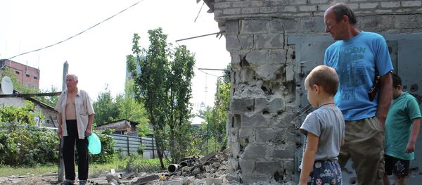 Consecuencias del bombardeo en Donetsk - Sputnik Mundo