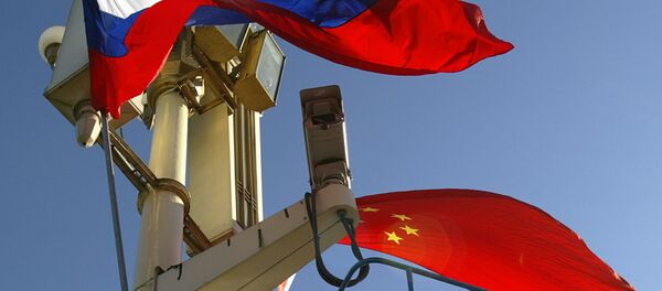 Banderas de Rusia y China Banderas de Rusia y China - Sputnik Mundo