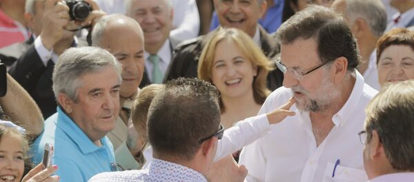 Mariano Rajoy, líder del Partido Popular (PP), durante su visita a Portomarin, norte de España - Sputnik Mundo